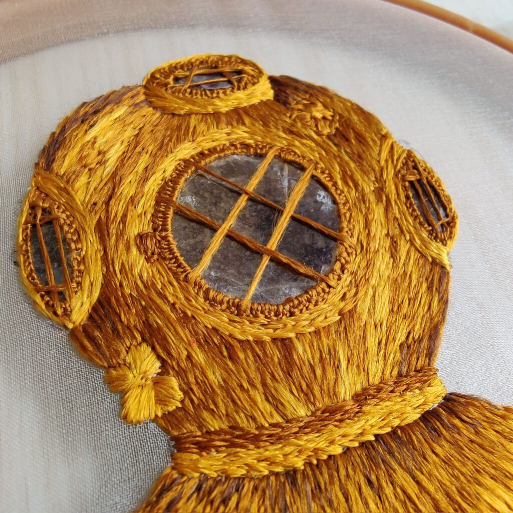 Antique diving helmet embroidery detail